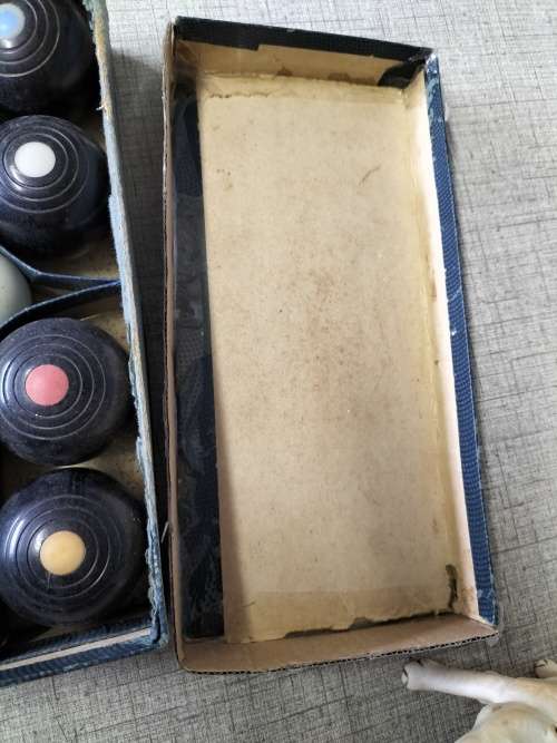 A VINTAGE  CARPET BOWLS SET