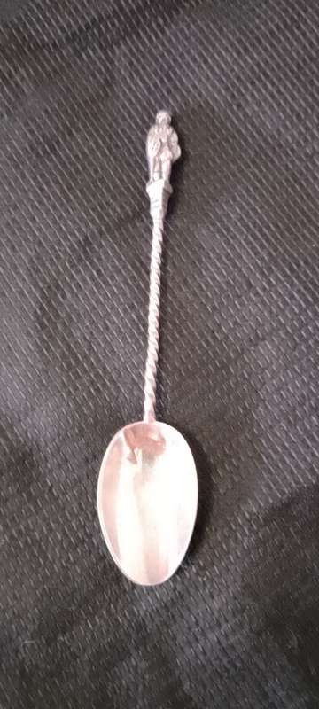 A SILVER ANTIQUE APOSTLE TEA SPOONS - 10.5cm long weight 9cm.  LION AND CROWN.