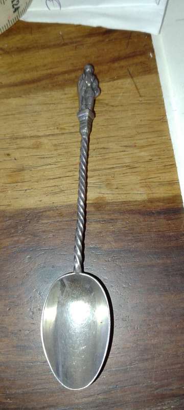 A SILVER ANTIQUE APOSTLE TEA SPOONS - 10.5cm long weight 9cm.  LION AND CROWN.