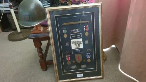 American helmet and medal frame from ww2