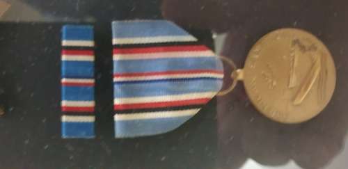 American helmet and medal frame from ww2