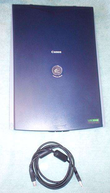 CANON: CanoScan LiTE 20 in good working order with cable and CD (Win 7 compatible)