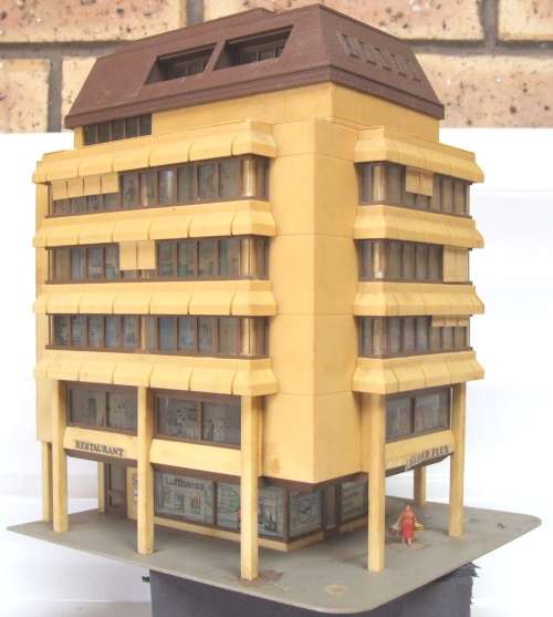 HO SCENERY: 7 Level Shop/Apartment Building in fair used condition.