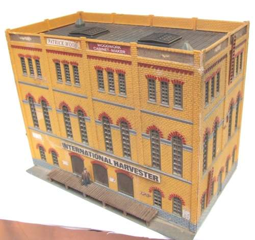 HO SCENERY: 3 Level Wood Factory Building in fair used condition.