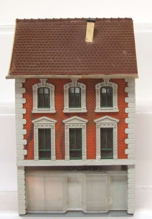 HO SCENERY: 3 Level German Style House/Shop in fair used condition.