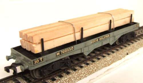 HORNBY DUBLO OO:  Vintage English Bogie Bolster Wagon with Wood Load in Good condition(England)