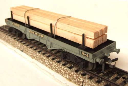HORNBY DUBLO OO:  Vintage English Bogie Bolster Wagon with Wood Load in Good condition(England)