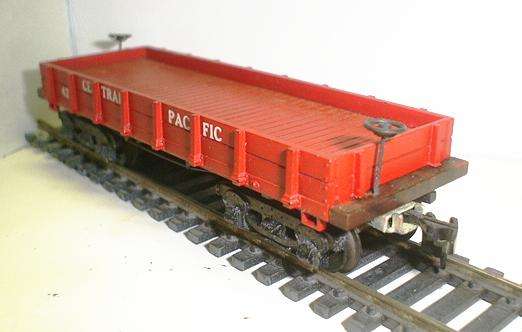 MANTUA HO/OO: Vintage CENTRAL PACIFIC Flat Wagon with emergency brakes. Not boxed.