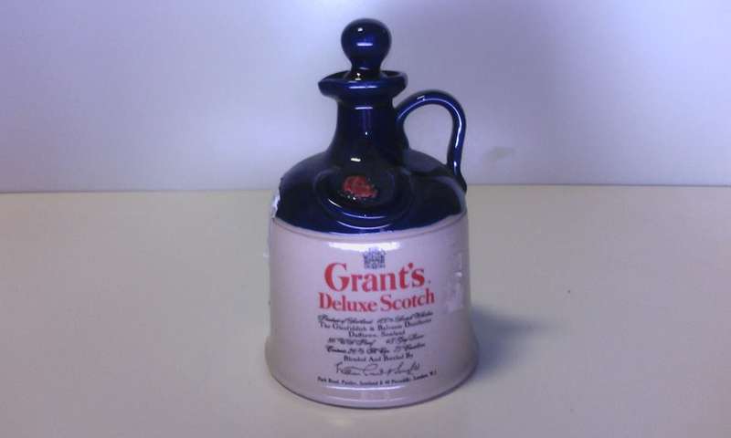 Antique "Grant's Deluxe Scotch" Bottle (Empty)
