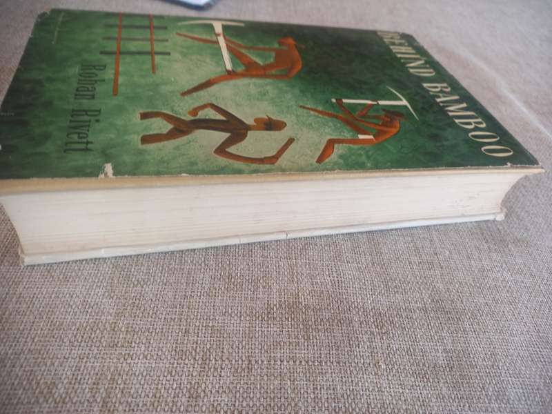 Behind Bamboo : An Inside Story of the Japanese Prisoner of war camps