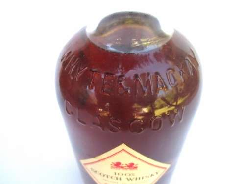 VINTAGE WHYTE & MACKAYS WHISKEY BOTTLE STILL SEALED (BAR)