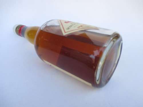 VINTAGE WHYTE & MACKAYS WHISKEY BOTTLE STILL SEALED (BAR)