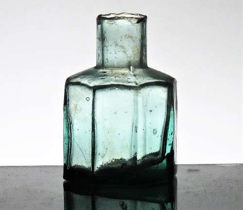 ANTIQUE OCTAGONAL INK BOTTLE