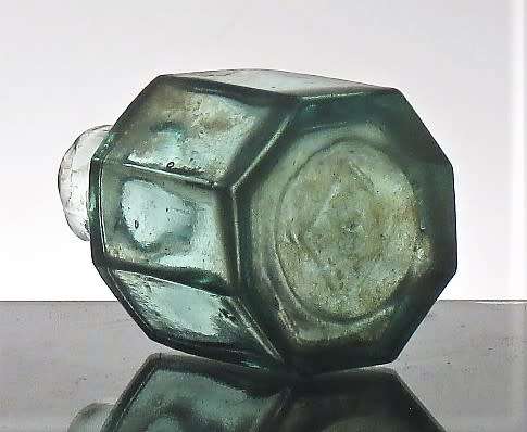 ANTIQUE OCTAGONAL INK BOTTLE