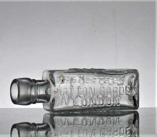 ROWLAND`S MACASSAR OIL BOTTLE
