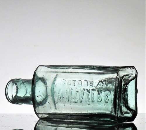 ANTIQUE WHITAKER and Co COLOUR WKS BOTTLE