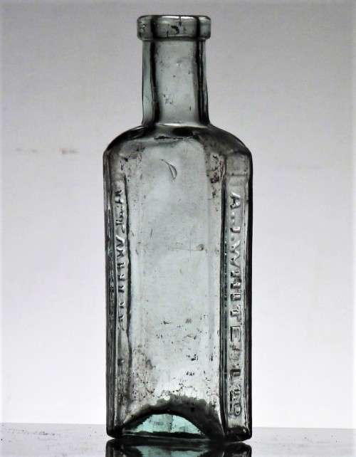 ANTIQUE AJ WHITE BOTTLE