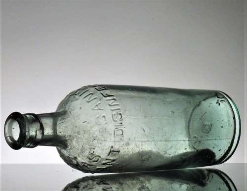 ANTIQUE SANITAS DISINFECTANT BOTTLE WITH APLIEDLIP