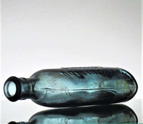 ICE BLUE WOODWARD CHEMIST BOTTLE