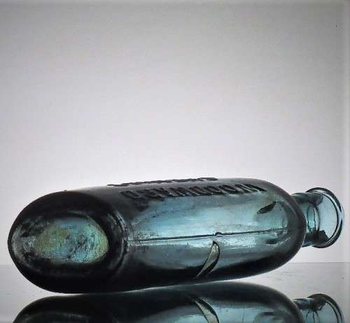 ICE BLUE WOODWARD CHEMIST BOTTLE
