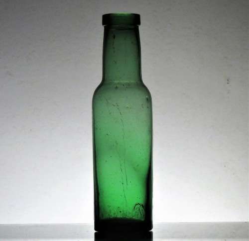 GREEN ANTIQUE FOOD BOTTLE
