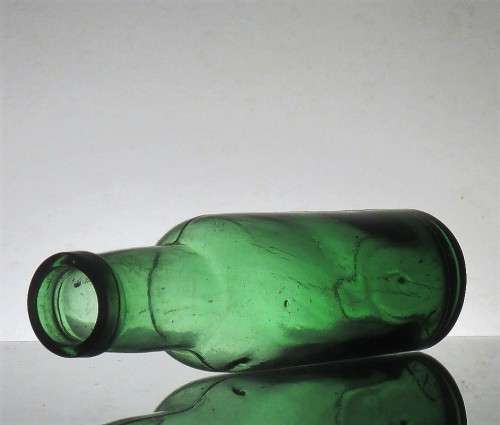 GREEN ANTIQUE FOOD BOTTLE