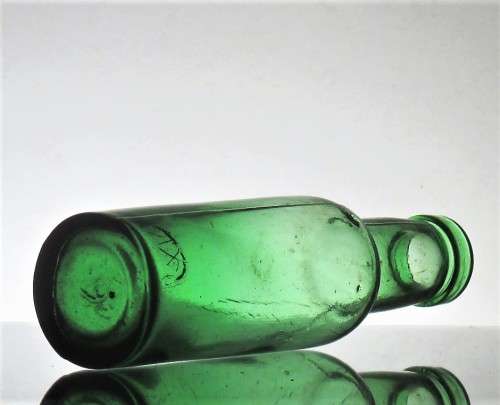 GREEN ANTIQUE FOOD BOTTLE