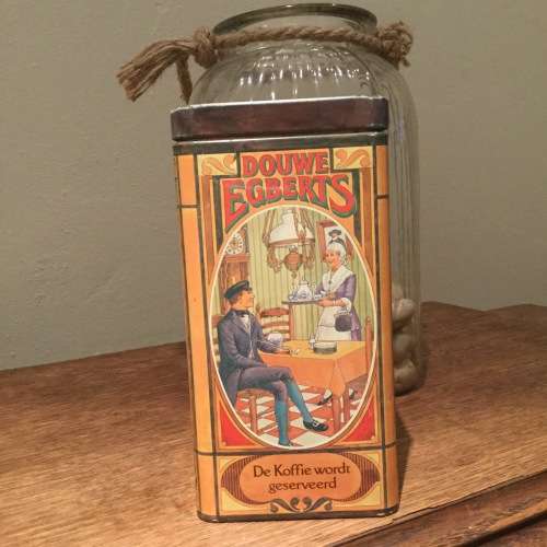 Vintage Douwe Egberts coffee tin depicting lady serving coffee made in holland