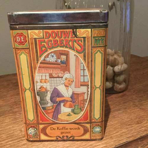 Vintage Douwe Egberts coffee tin depicting lady serving coffee made in holland