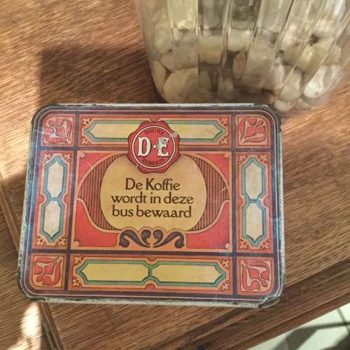 Vintage Douwe Egberts coffee tin depicting lady serving coffee made in holland