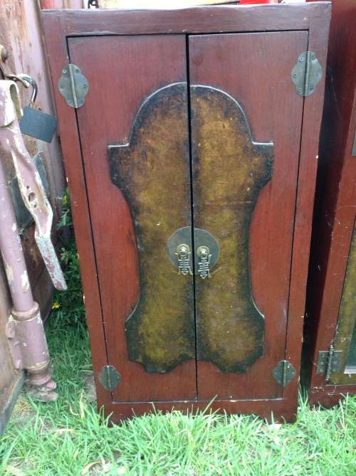 Stunning red and gold small cabinet