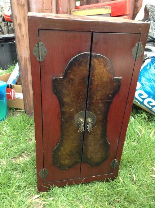 Stunning red and gold small cabinet