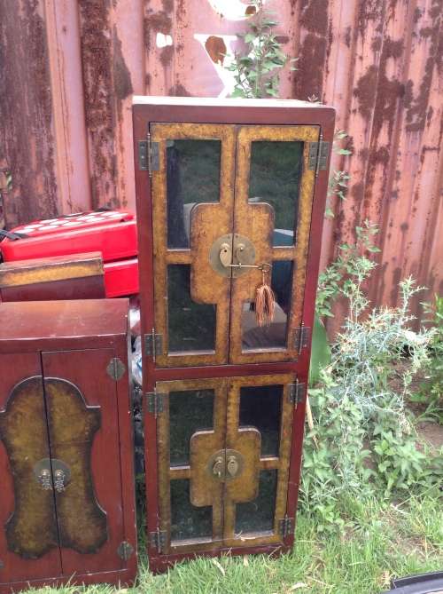 Stunning detail red and gold with glass insert cabinet