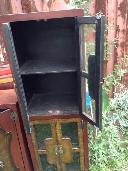 Stunning detail red and gold with glass insert cabinet