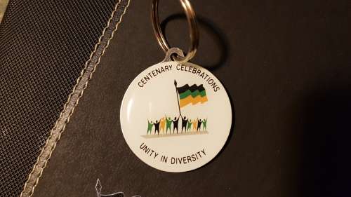 Nelson Mandela Collectors Clad gold medallion, commemorative Diary and Keychain.
