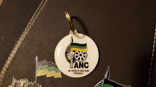 Nelson Mandela Collectors Clad gold medallion, commemorative Diary and Keychain.