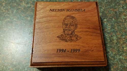 Nelson Mandela Collectors Clad gold medallion, commemorative Diary and Keychain.