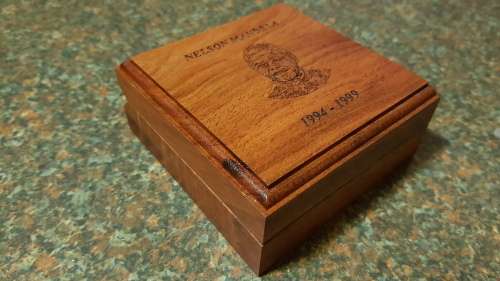 Nelson Mandela Collectors Clad gold medallion, commemorative Diary and Keychain.