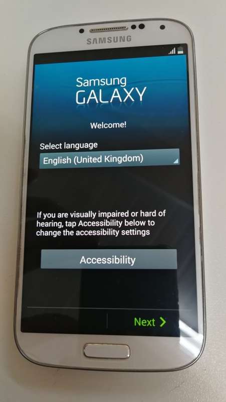 Samsung S4 with Charger. Absolutely beautiful condition!!