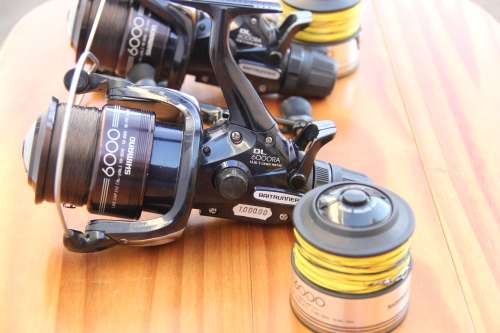 2 * Shimano DL6000RA Baitrunner Fishing Reels