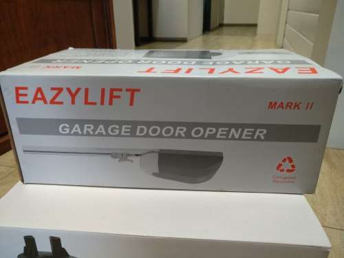 Garage door opener (1xMotor & 2xRemotes + 1x Backup Battery)