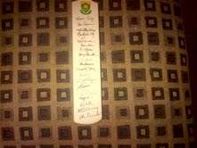 Mini S.A. Cricket bat with signatures