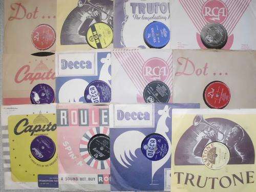 12 collectable gramophone records  (Belafonte, Pat Boone, Bill Haley and his comets, Gene Vincent...