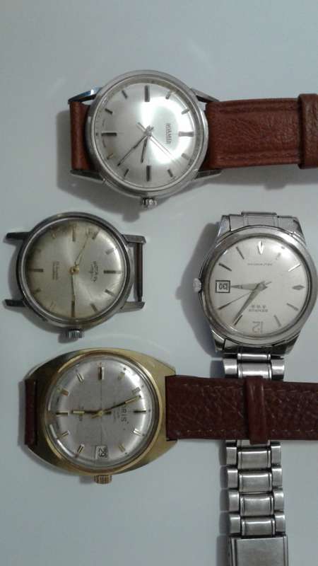 Four vintage, men's watches: Oris, Roamer, Rotary and Benrus