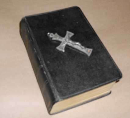 Crucifix and old Bible (includes the Apocrypha)