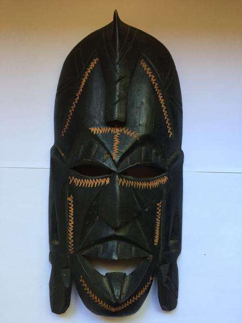 Handcarved wooden african mask for hanging