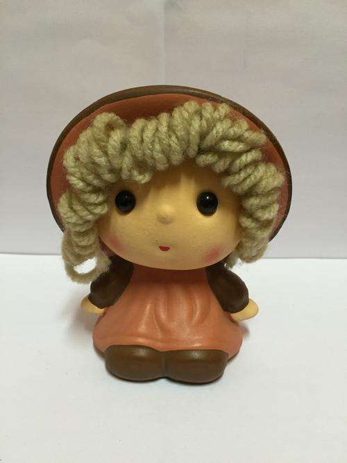 Ceramic doll style piggy bank