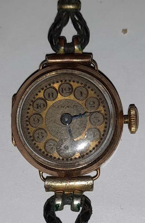 Antique LA MIMUTE ladies wrist watch in a gold case