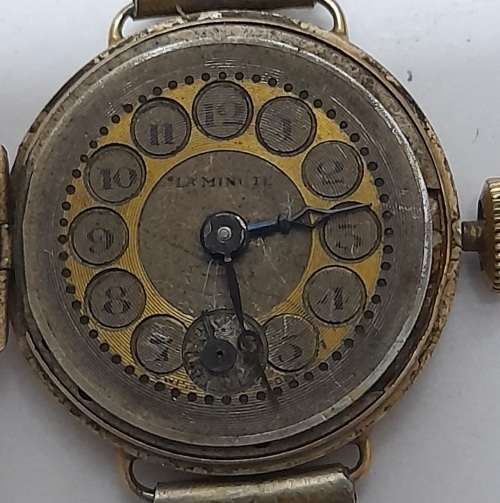 Antique LA MIMUTE ladies wrist watch in a gold case