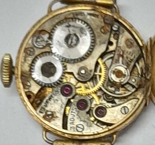 Antique LA MIMUTE ladies wrist watch in a gold case